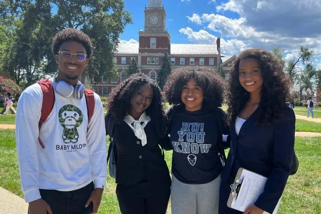 College students standing together on the yard